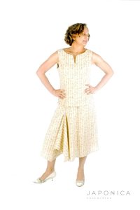 Front View of Asymmetrical Flared Skirt in Japanese Cotton Cream Script Print Fabric
